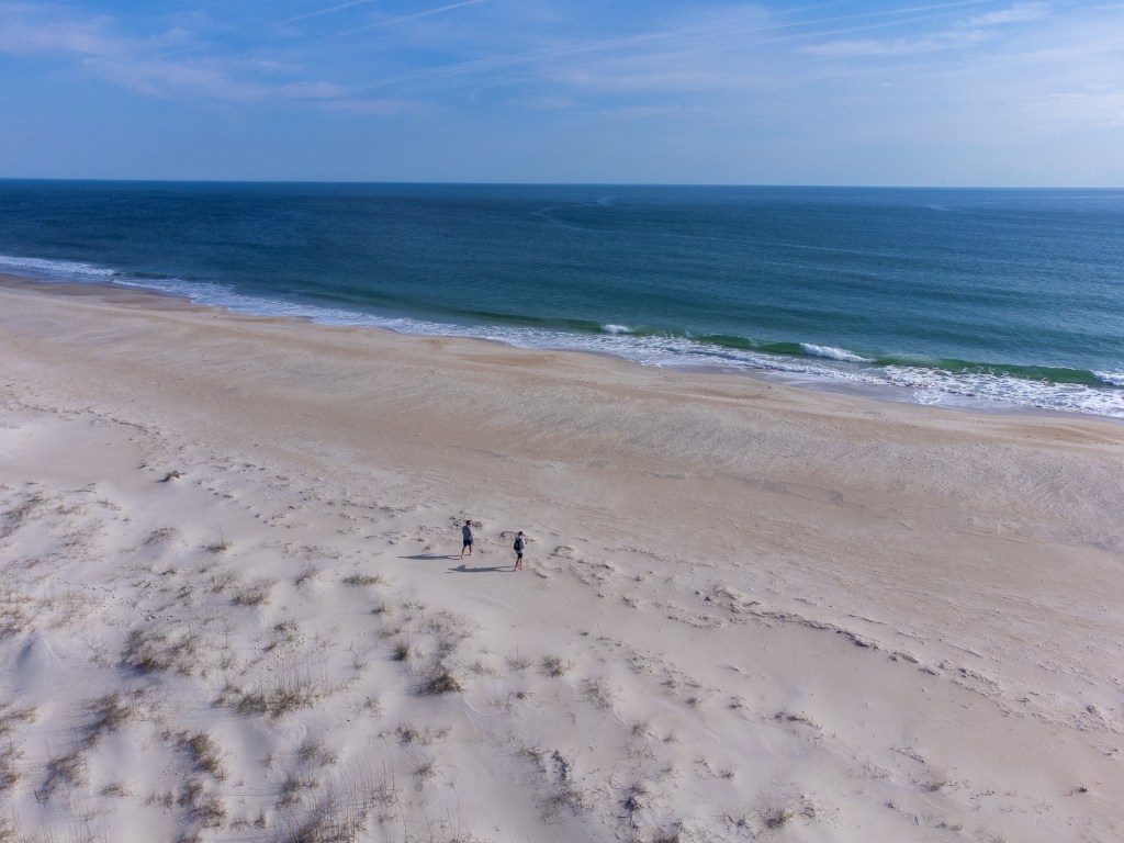 Aerial shot of Masonboro Island's north end looking over the beach toward the ocean